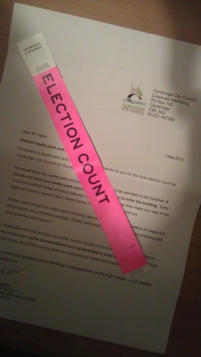 pink wristband saying Election Count on it