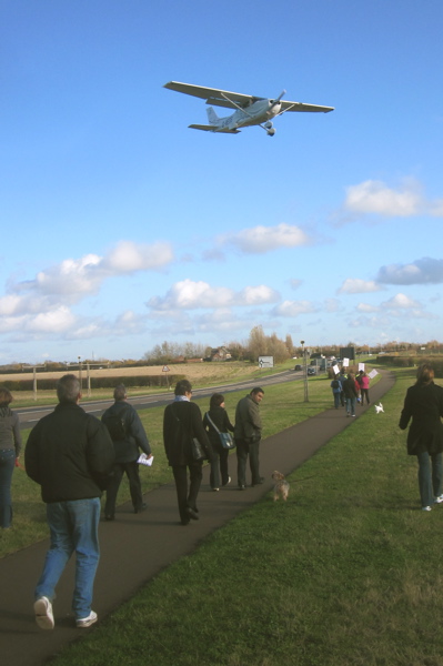 Planes Flew Over Those Walking Around Marshall Airport in Cambridge on the 15th of November to Express Support for the Company Continuing to Fly from the Airport.   