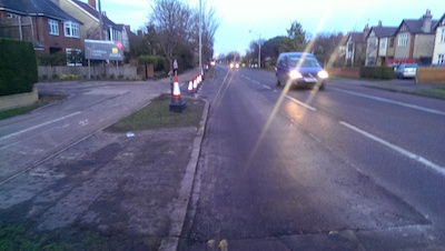 Photo of new junction with resurfacing as described.