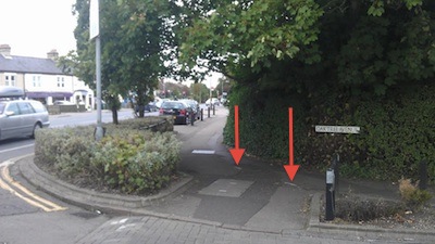 Arrows show only remnants of indication this is the start of a shared use cycle/pedestrian path. 