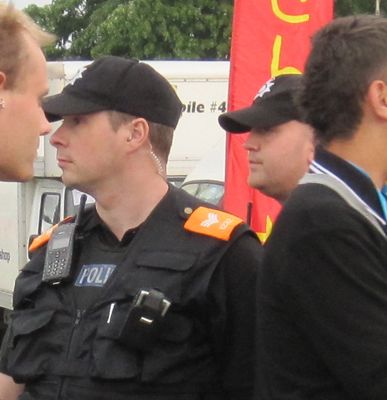 I found the orange epauletted intelligence gathering police an oppressive presence at the 2009 Strawberry Fair 