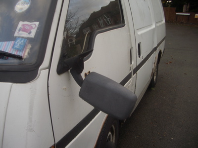 Images of broken wing mirrors and broken glass
