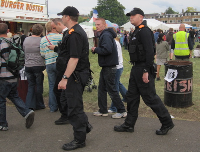 UK Police Officers Wearing Orange Epaulets. Members of an Evidence Gathering Team