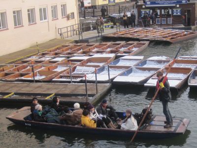 Cambridge punter wearing rubber gloves and a lifejacket earlier this year.