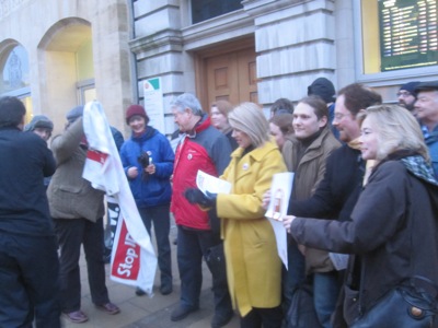 Gathering outside Cambridge's Post Office where minister Phil Woolas planned to launch an expansion of the ID Card and National Identity Register.